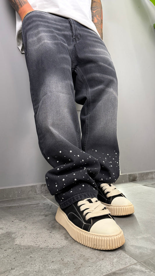 JEANS BAGGY CON BORCHIE